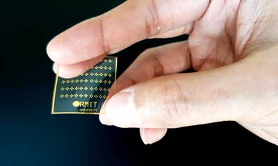 hand holding a flexible electronic sensing prototype device
