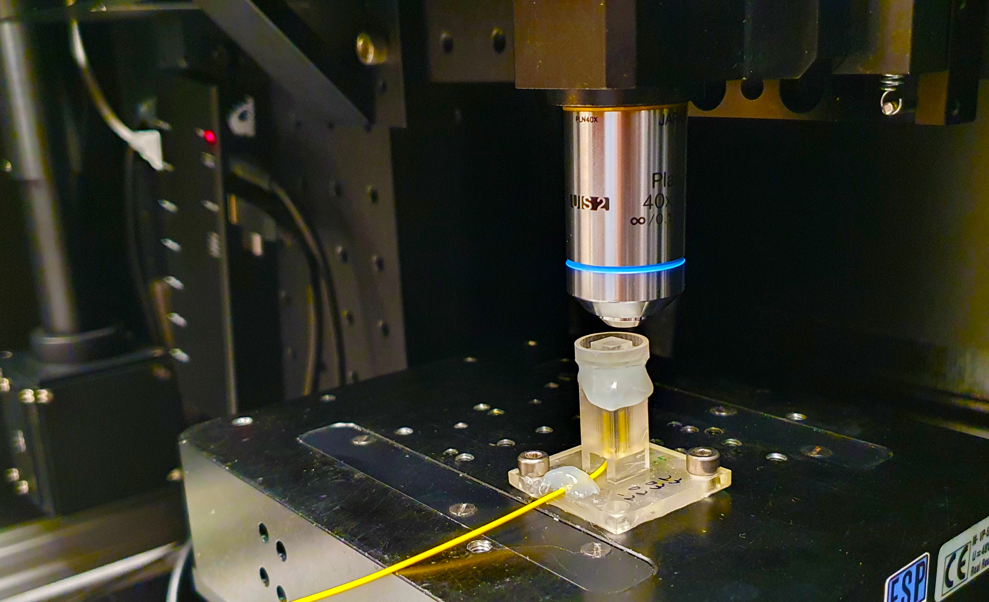 An optical fiber cable is set up on a 3D printer