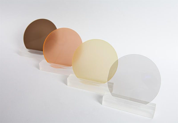 The different color nuances of the AlYN/GaN wafers result from different yttrium concentrations and growth conditions