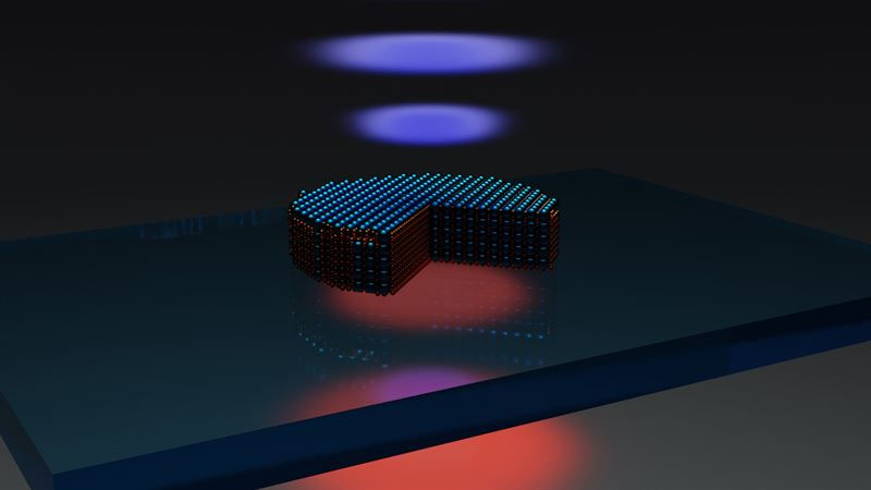 Excitation near-infrared laser (red bottom one) - excites the nanodisk fabricated from the 3R-molybdenum disulfide flake, standing on a glass substrate