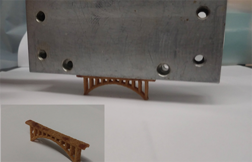 A 6.5 centimeter 3D-printed sand bridge holds 300 times its own weight